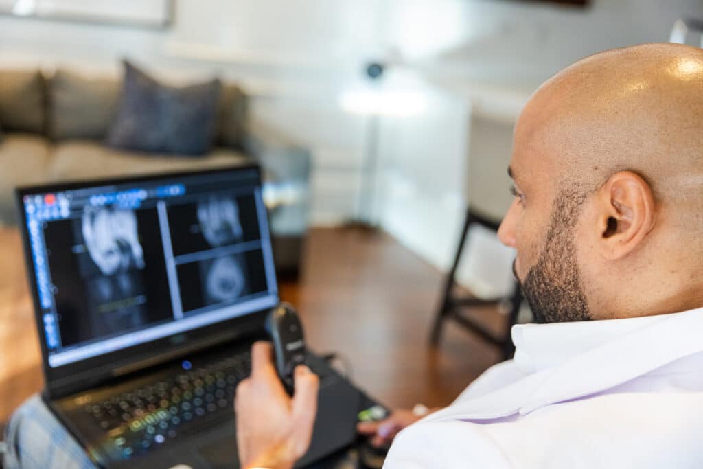 Radiologist Reading Images on Laptop from Home
